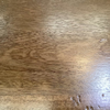 Close-up of a wooden surface with visible grain and texture