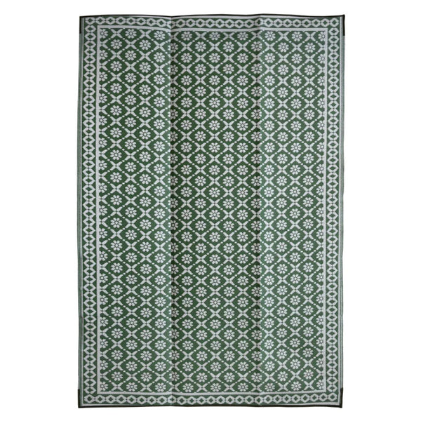 Green and white patterned rug on a white background