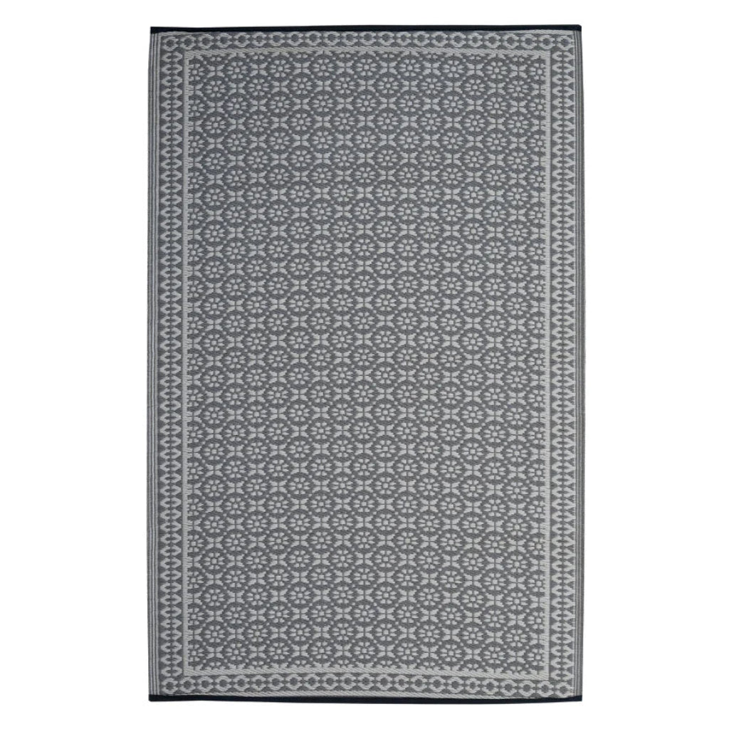 Grey and white Patterned floral, geometric rug on a white background