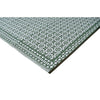 Corner of a Green and white patterned rug on a white background